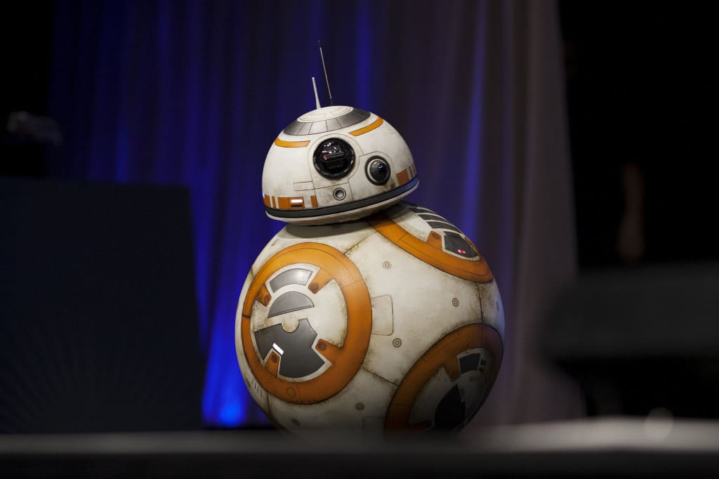 A robot character crosses the stage at the kick-off event of the Star Wars celebration convention in Anaheim